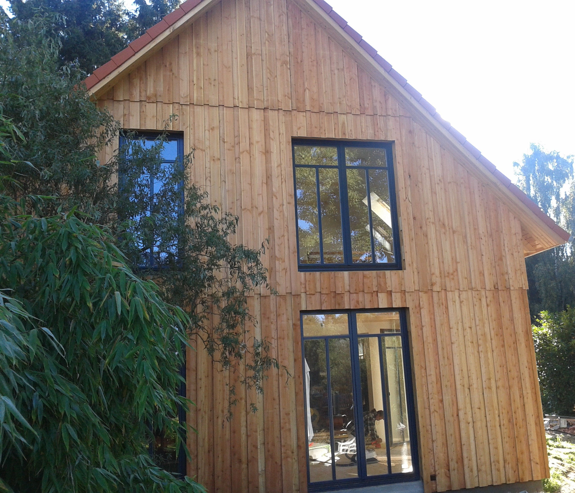 Anbau in Holzrahmenbau mit Boden-Deckelschalung in Lrche natur